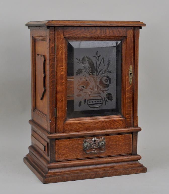 Appraisal: English Victorian Oak Tobacco Cabinet with florally engraved glass door