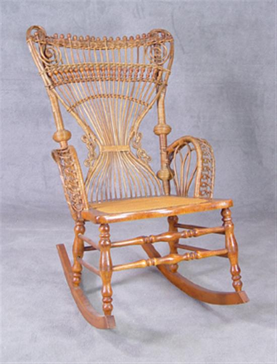 Appraisal: Haywood-Wakefield Victorian Wicker Rocker Circa Stick and turned fan back