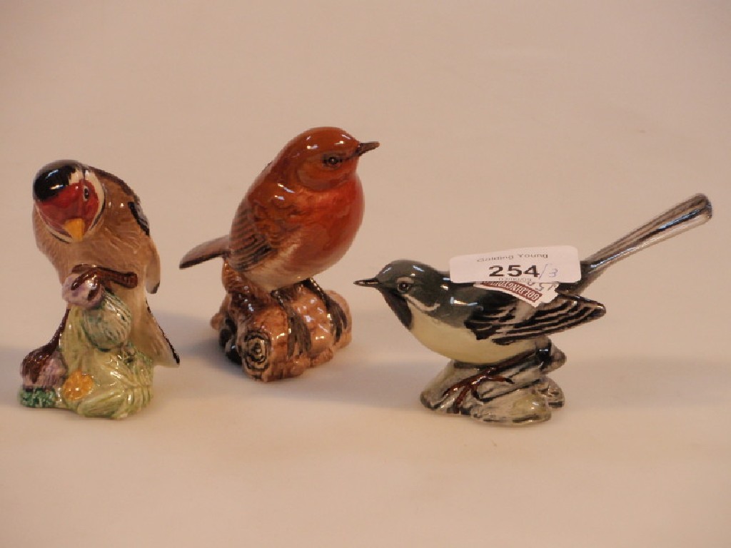 Appraisal: Three Beswick birds Grey wagtail Robin Goldfinch cm high