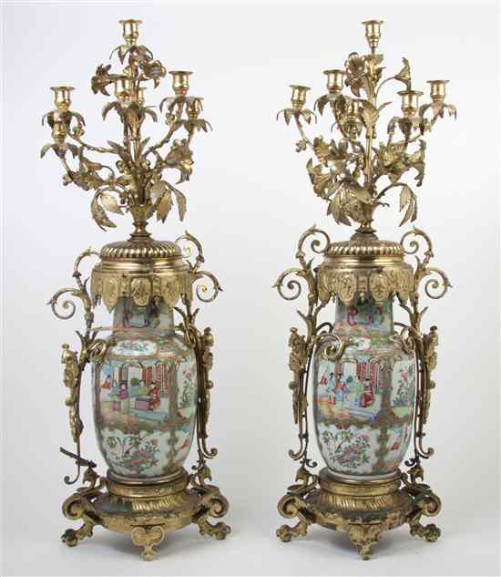 Appraisal: A Pair of Seven-Light Candelabra having porcelain rose medallion baluster