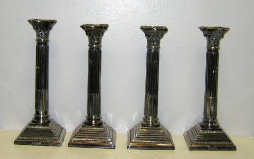 Appraisal: FOUR SHEFFIELD PLATED SILVER CANDLESTICKS Possibly Mark Willis Sons late