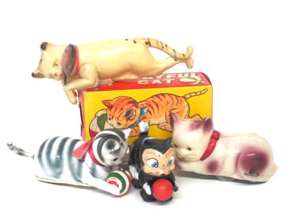 Appraisal: Four vintage cat-re lated toysjapan and china