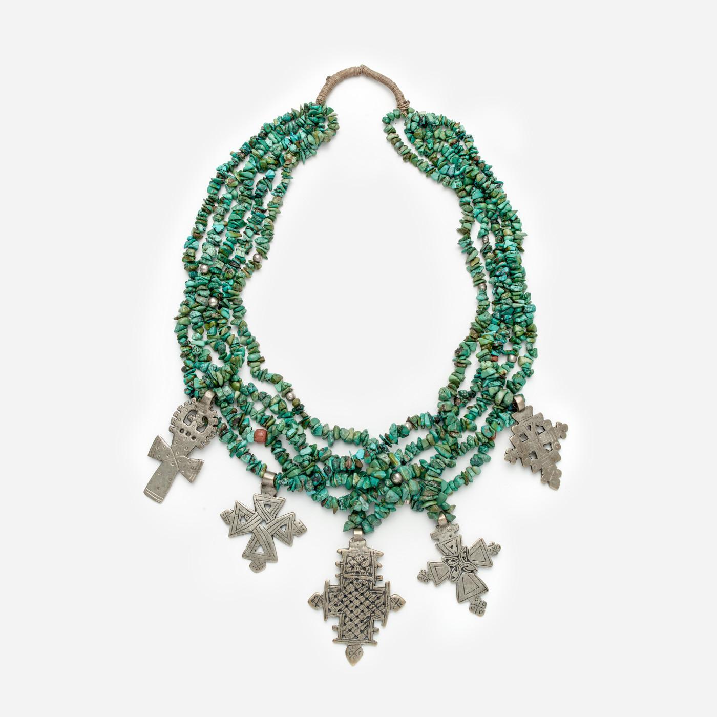 Appraisal: MULTI STRAND TURQUOISE AND CROSSES NECKLACE A multi strand turquoise