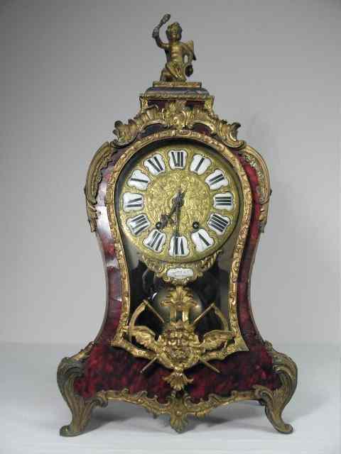 Appraisal: Tiffany Co bronze mounted Boulle mantle clock Cartouche-shaped body with