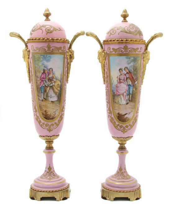 Appraisal: Pair of Sevres Style Gilt Metal Mounted Urns having domed