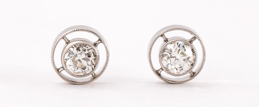 Appraisal: PLATINUM DIAMOND SOLITAIRE STUD EARRINGS Two old European round cut