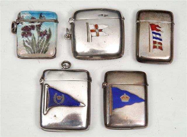 Appraisal: A COLLECTION OF FIVE ENAMELLED SILVER VESTA CASES four with