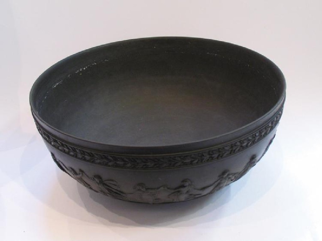 Appraisal: AN EARLY TH CENTURY WEDGWOOD BLACK BASALT BOWL moulded in