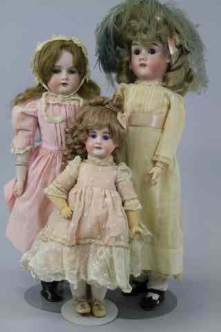 Appraisal: LOT OF THREE GERMAN BISQUE DOLLS The largest is a