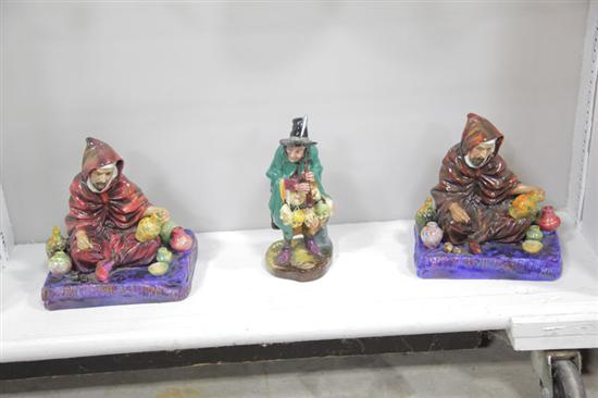 Appraisal: THREE ROYAL DOULTON FIGURES Two versions of ''The Potter'' HN