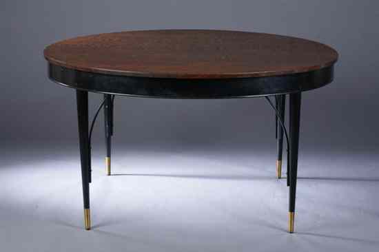 Appraisal: MID-CENTURY MODERN OAK AND PARCEL-EBONIZED DINING TABLE Oval top above