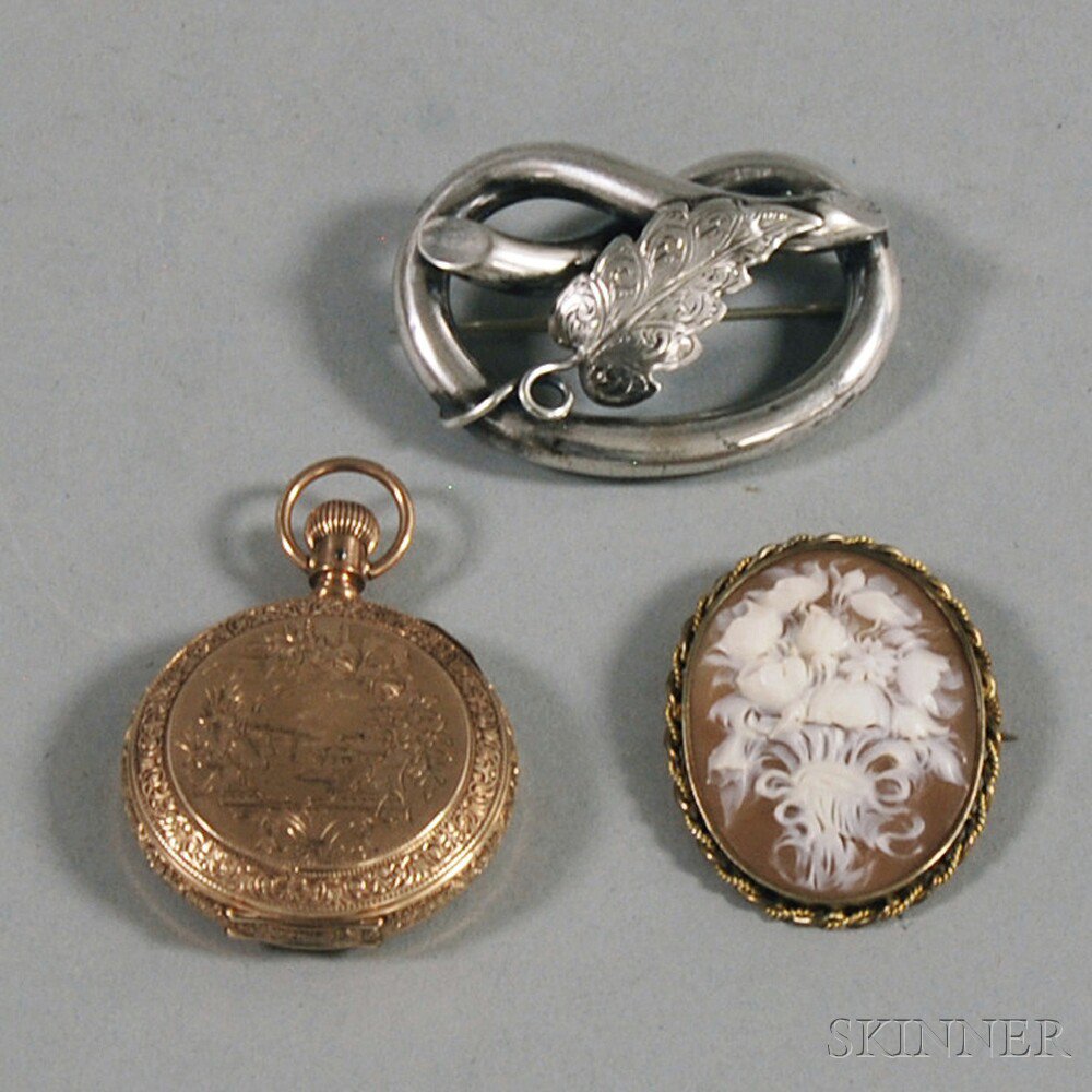 Appraisal: Three Pieces of Jewelry a gilt silver-framed shell-carved cameo brooch