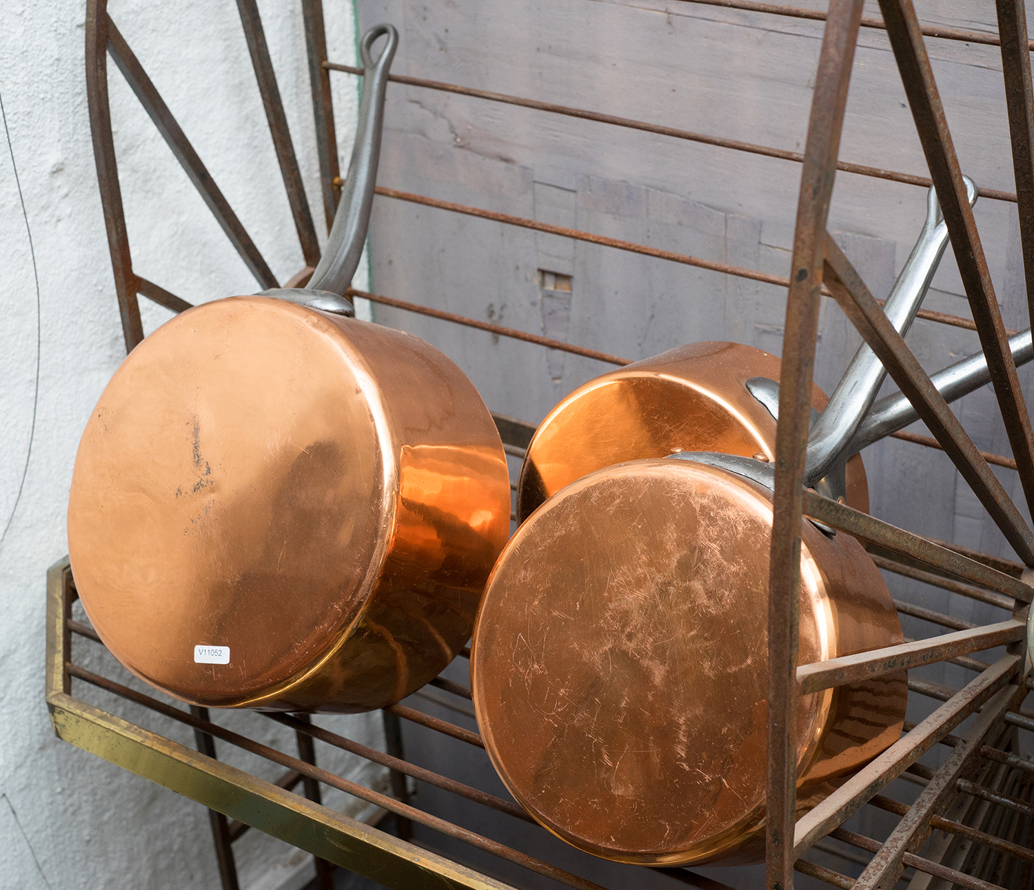 Appraisal: A SET OF FIVE FRENCH AND COPPER POTS Varying sizes