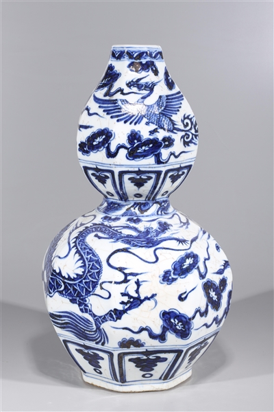 Appraisal: Chinese blue and white double gourd porcelain vase with dragon