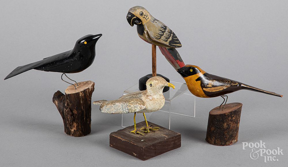 Appraisal: Four carved and painted birds mid th c Four carved