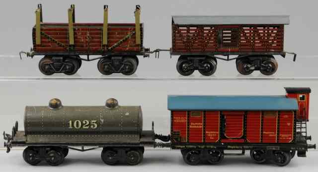 Appraisal: FOUR BING FREIGHT CARS O gauge lithographed tin bodies includes