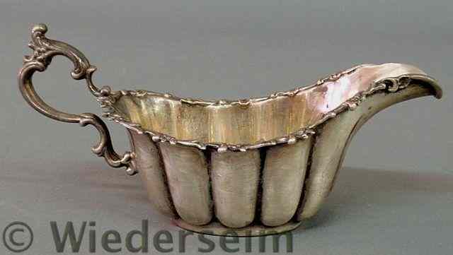 Appraisal: Sterling silver gravy or sauce boat h x l troy