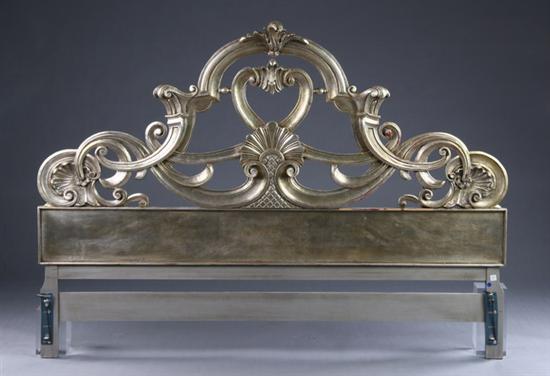 Appraisal: ART DECO INSPIRED SILVER-GILDED HEADBOARD th century Arching foliate-carved crest