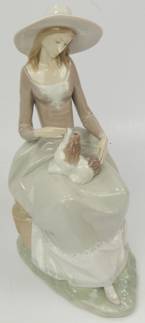 Appraisal: A Lladro figure of Lady with Pekingese dog cm high