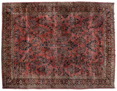 Appraisal: Sarouk rug repeating floral bouquets on dark burgundy field ft