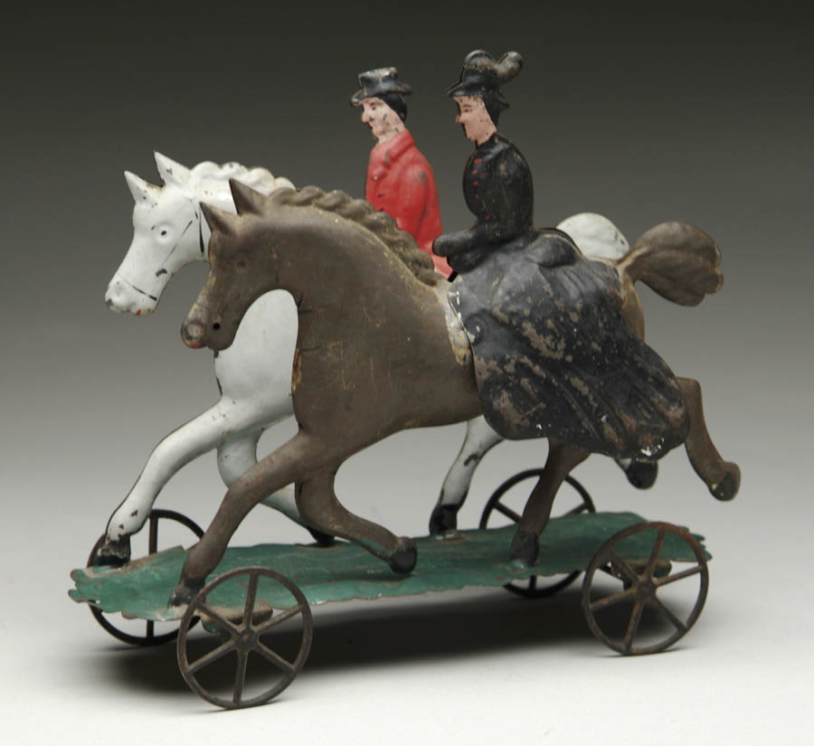 Appraisal: HULL AND STAFFORD DOUBLE RIDERS PLATFORM TOY A gentleman riding