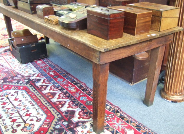 Appraisal: An oak large folding table with a rectangular top and