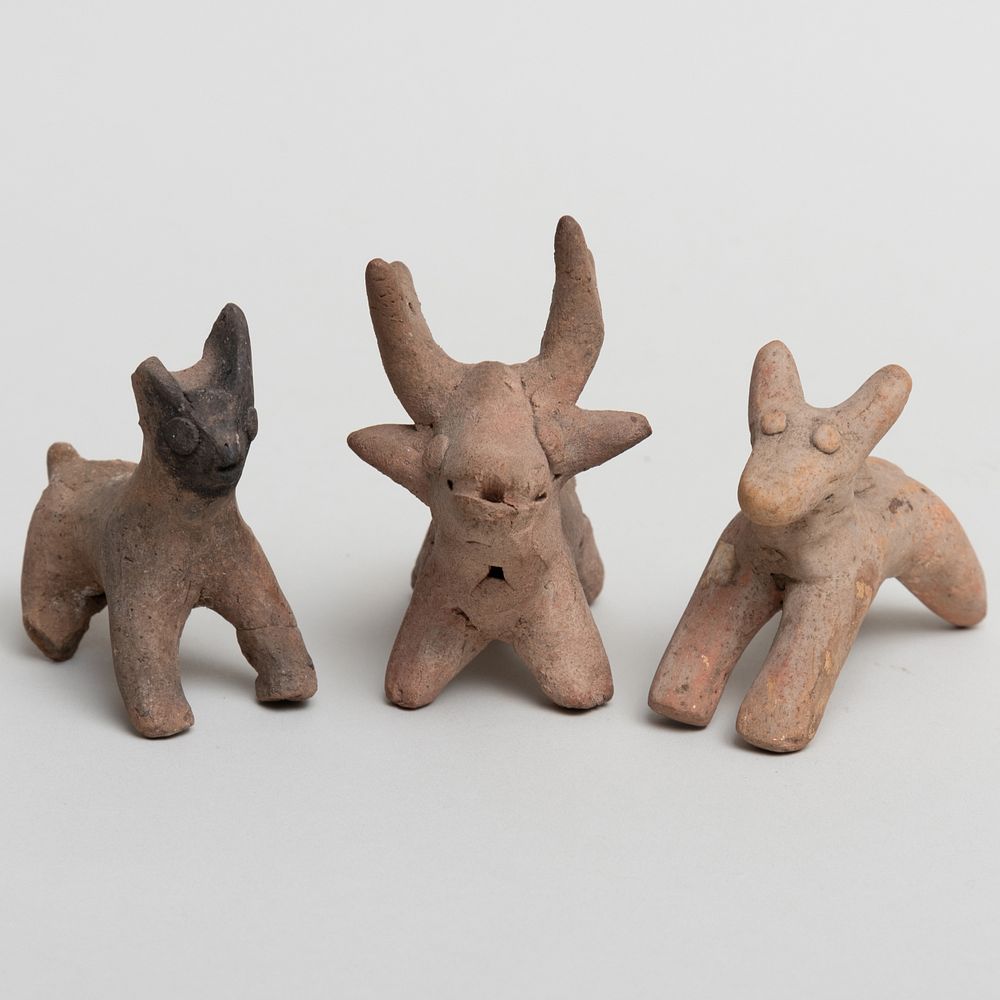 Appraisal: Group of Three Ancient Persian Pottery Stag Votives The largest