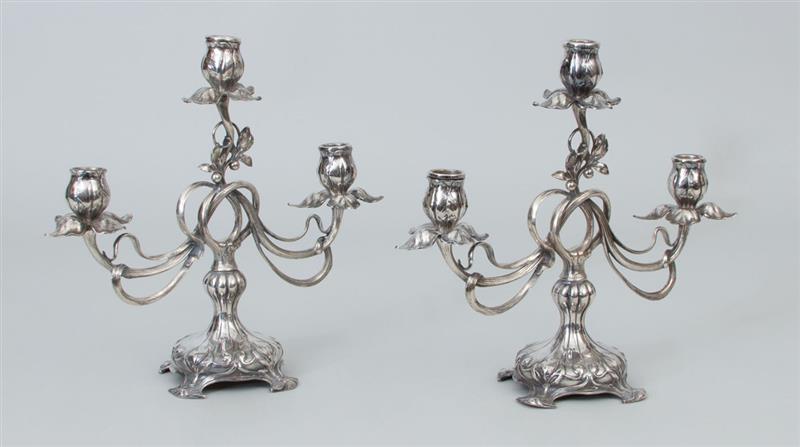 Appraisal: Pair of Continental Art Nouveau Silver-Plated Three-Light Candelabra Each impressed