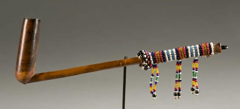 Appraisal: Zulu pipe with beads th century A wood pipe with