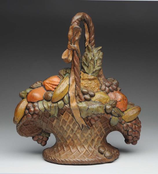 Appraisal: Cast Iron Fruit Basket Doorstop Depicts fruit in oversized wicker