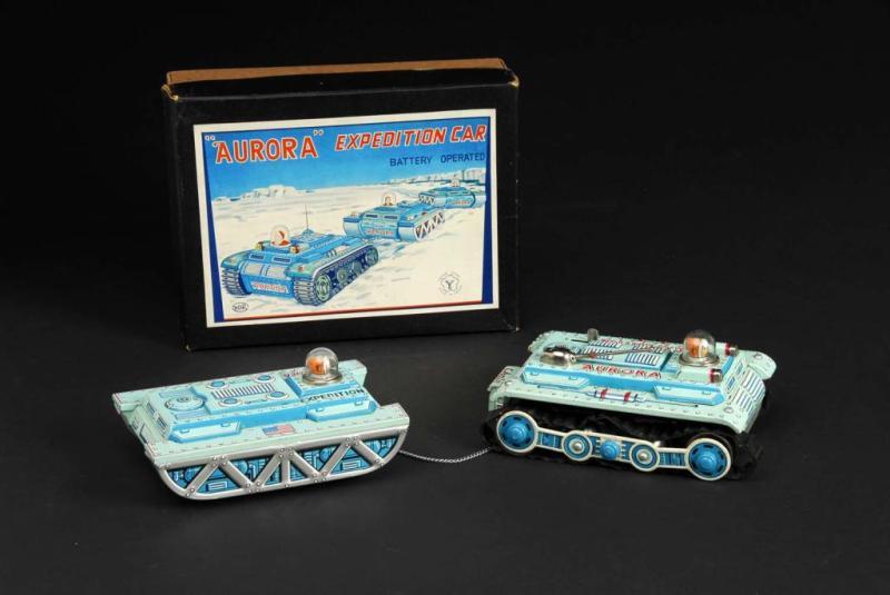 Appraisal: Tin Aurora Expedition Car - Two Vehicle Version Description Japanese