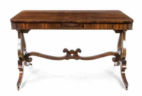 Appraisal: A Regency Rosewood Writing Desk having a rectangular top with