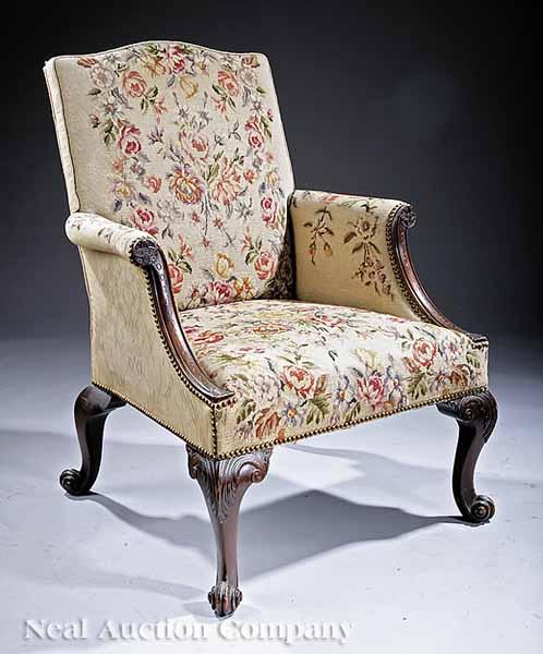 Appraisal: A Georgian-Style Carved Mahogany and Needlepoint Armchair late th c