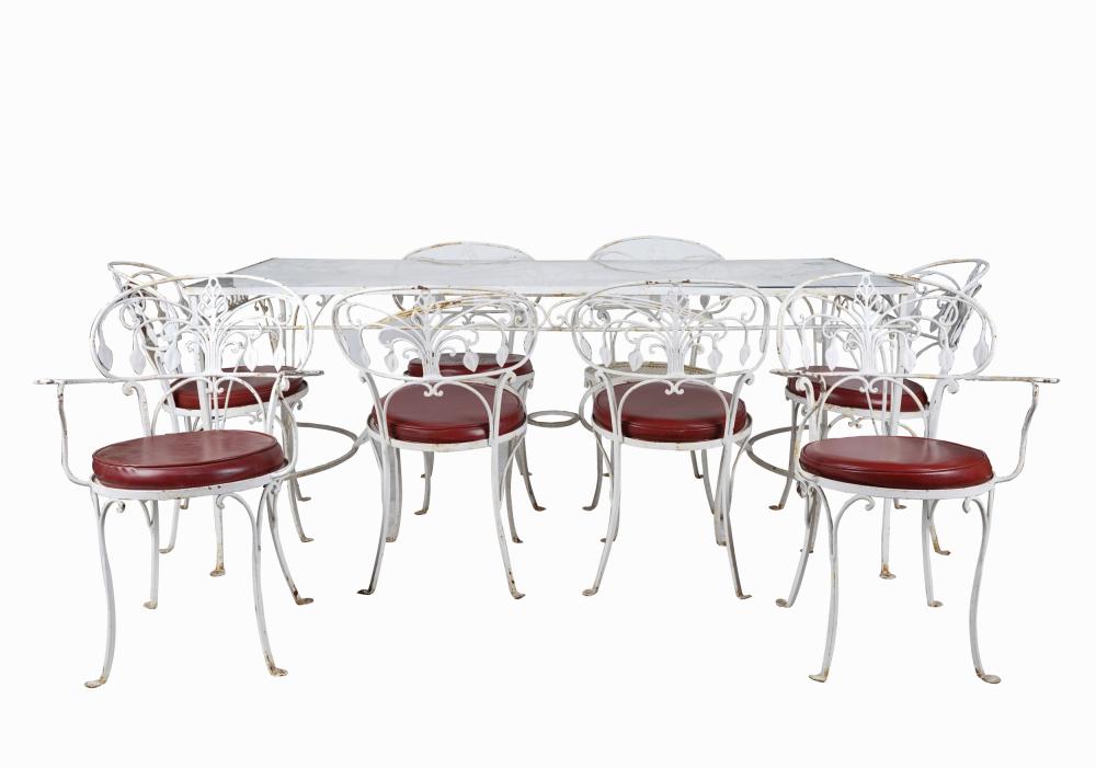 Appraisal: WHITE PAINTED IRON PATIO DINING SETcomprising a glass-top rectangular dining