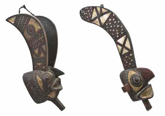 Appraisal: Two African Gurunsi Style Carved Masks each with bared teeth