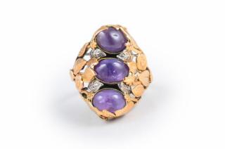 Appraisal: A Vintage Sapphire Gold Ring Set with three purple cabochon