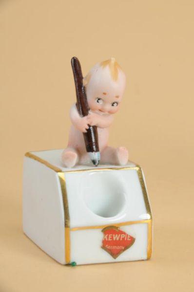 Appraisal: Action Kewpie Inkwell Germany ca all bisque action figure of