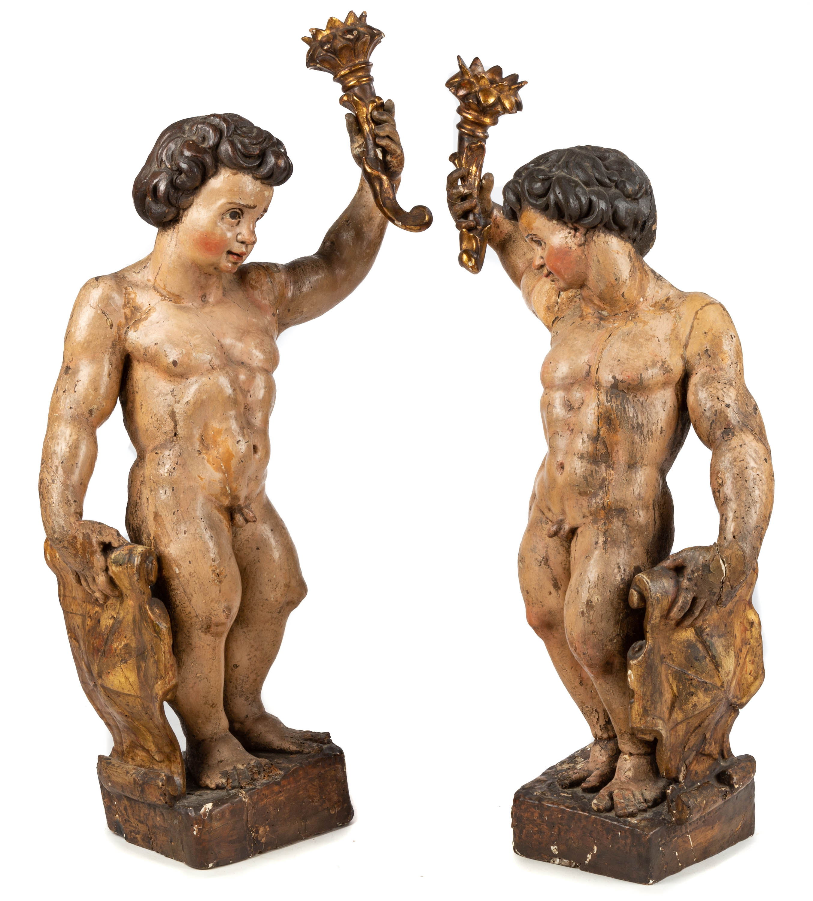 Appraisal: EARLY CARVED AND POLYCHROME PAINTED GILDED FIGURES with shields and