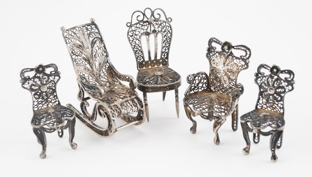 Appraisal: Sterling silver miniature furniture set featuring a rocking chair and