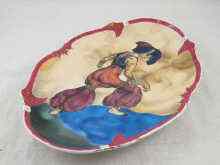 Appraisal: A Russian Soviet ceramic shaped oval platter decorated with the