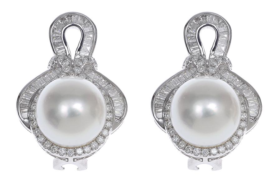 Appraisal: A PAIR OF SOUTH SEA PEARL AND DIAMOND EARRINGS Each