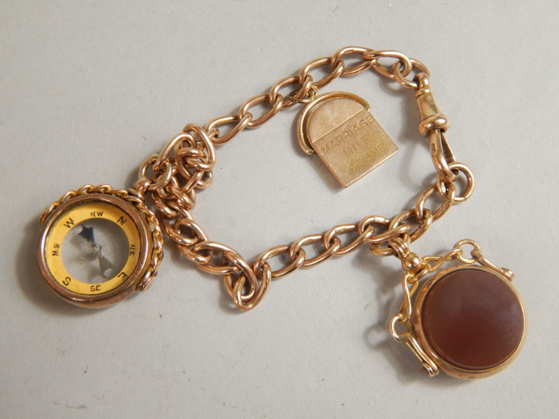 Appraisal: A ct gold watch chain the chain with three fobs