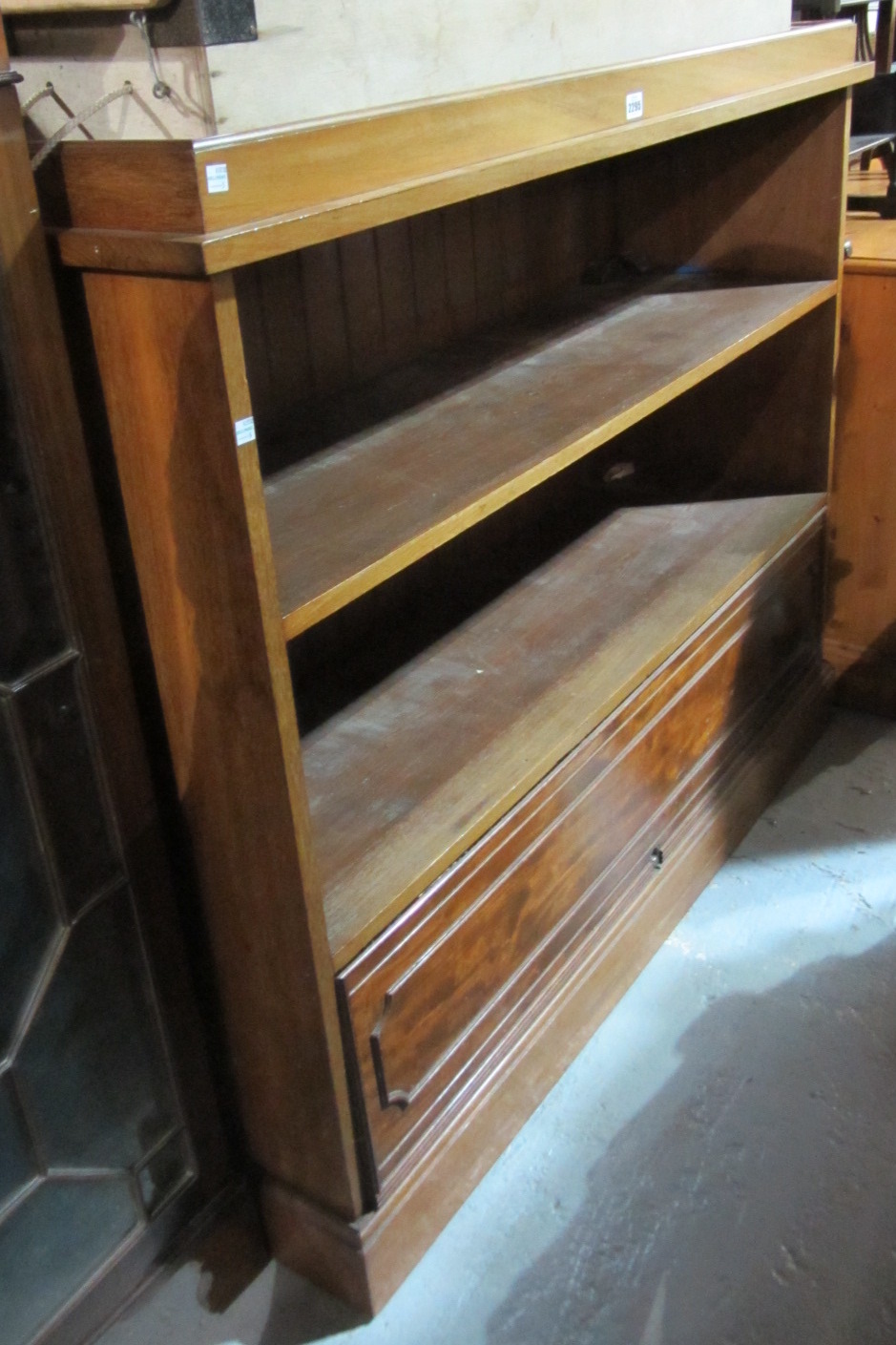 Appraisal: A th century walnut bookcase with a pair of shelves