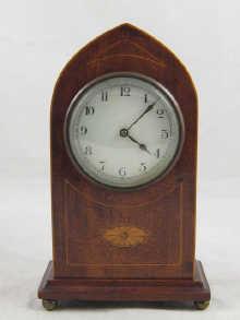 Appraisal: An arch shaped mahogany mantel clock with box wood inlay