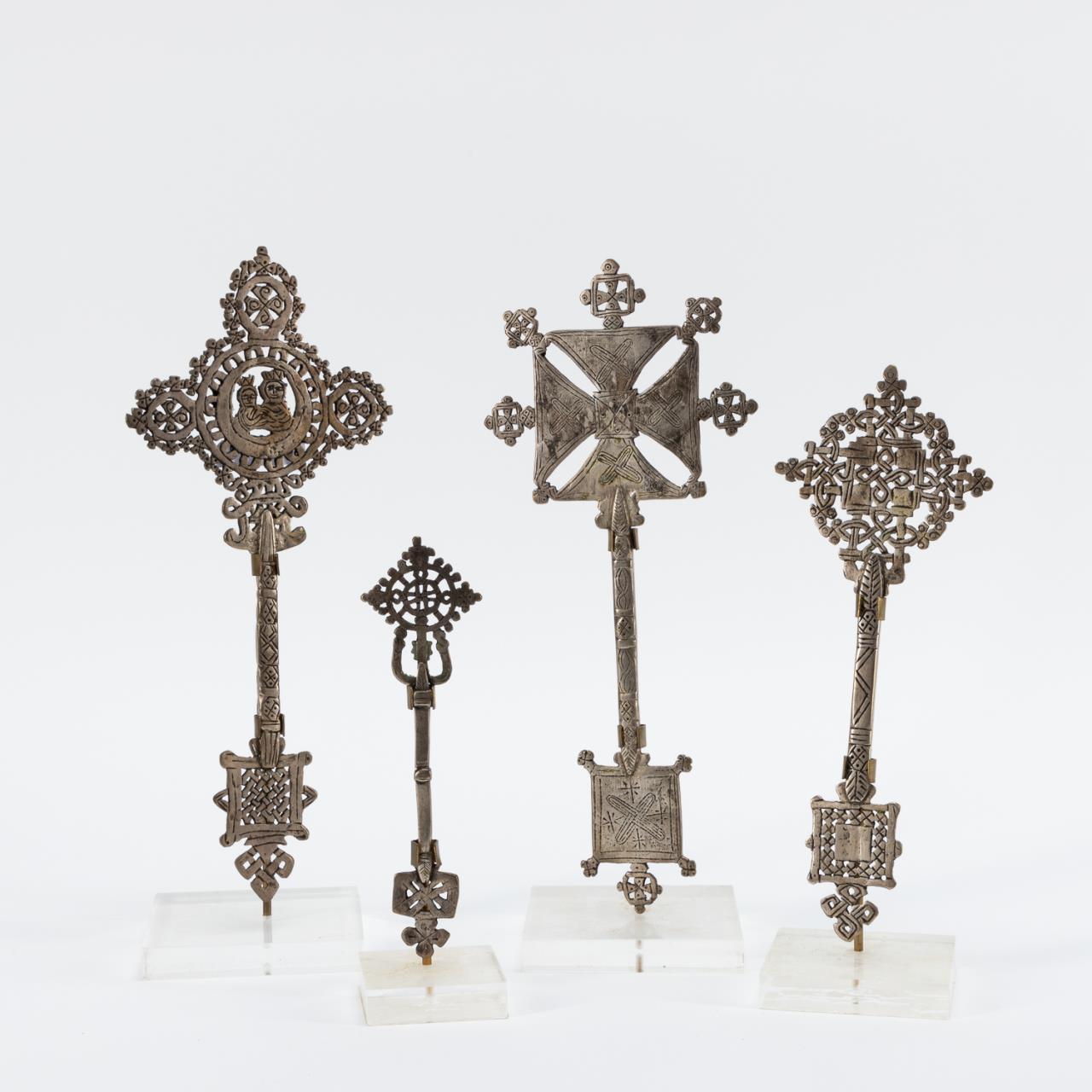 Appraisal: ETHIOPIAN WHITE METAL COPTIC CROSSES ON STANDS East African th