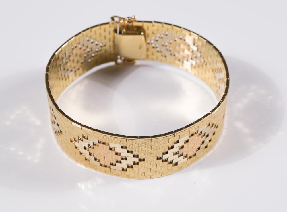 Appraisal: BUCHERER EIGHTEEN KARAT GOLD STRAP BRACELET The - k yellow