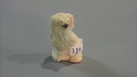 Appraisal: A Staffordshire figure of a poodle discolouration on leg