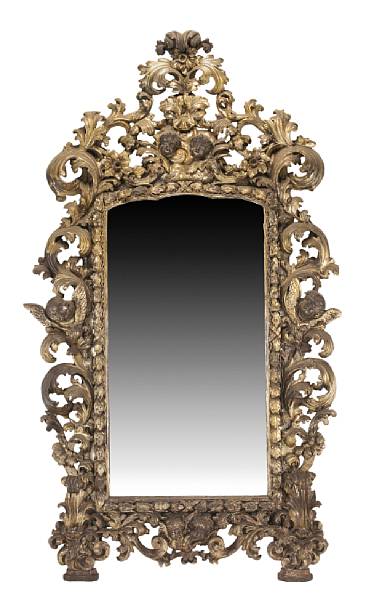 Appraisal: An imposing Italian Rococo silver gilt and giltwood pier mirror