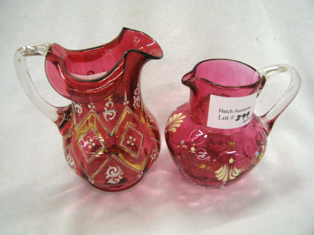 Appraisal: Victorian Cranberry Art Glass Milk Pitchers enameled attributed to Moser