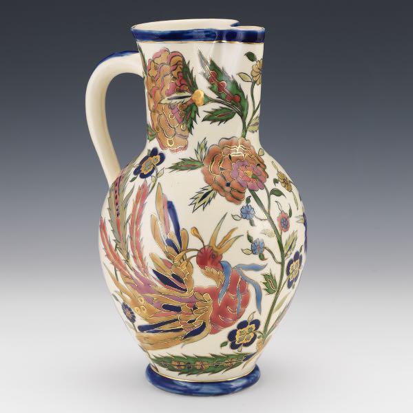 Appraisal: ZSOLNAY BIRDS OF PARADISE PITCHER x Lusterware cream colored ground